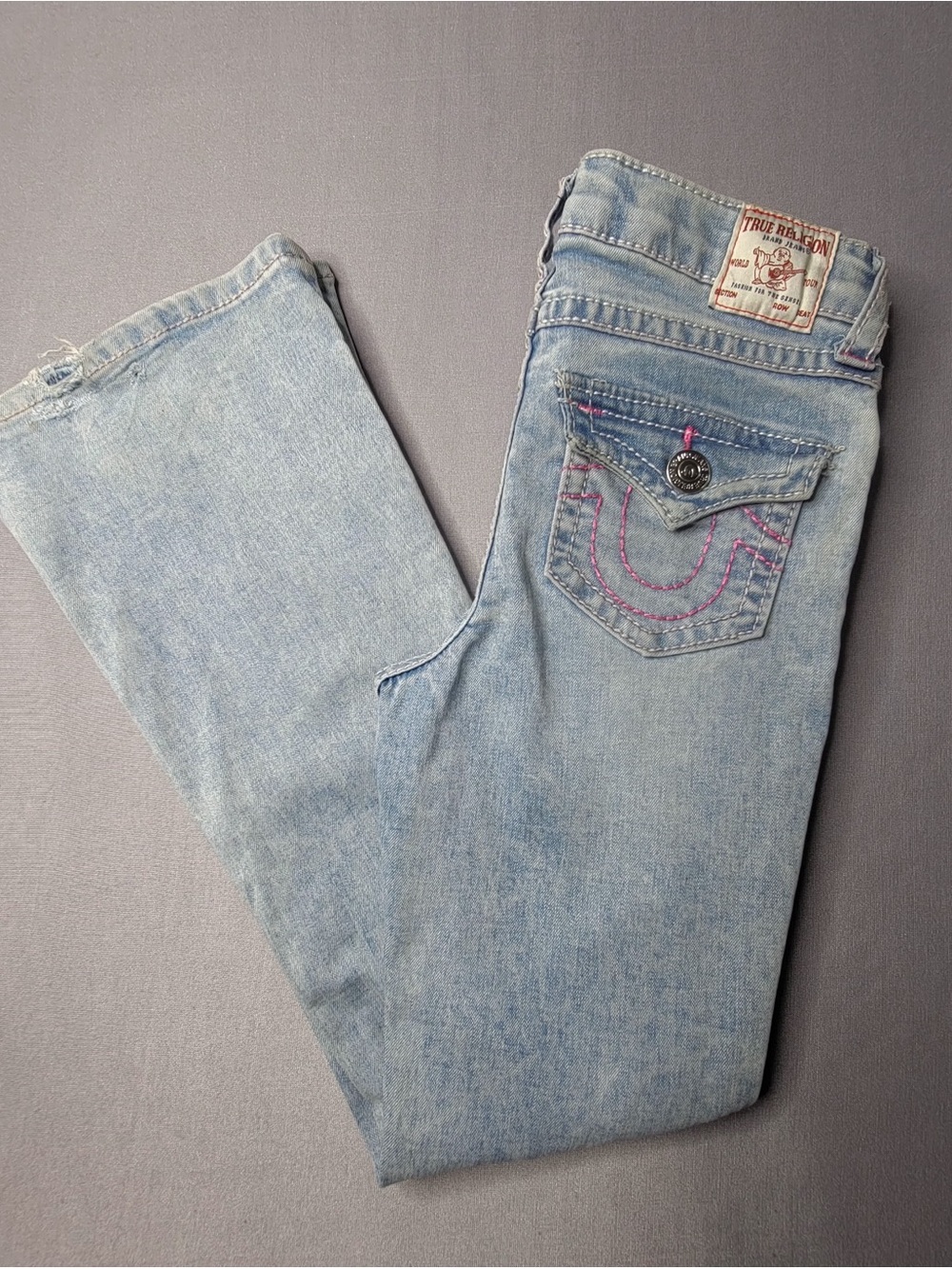 True Religion Light Blue Boot Cut Jeans with Pink Stitching